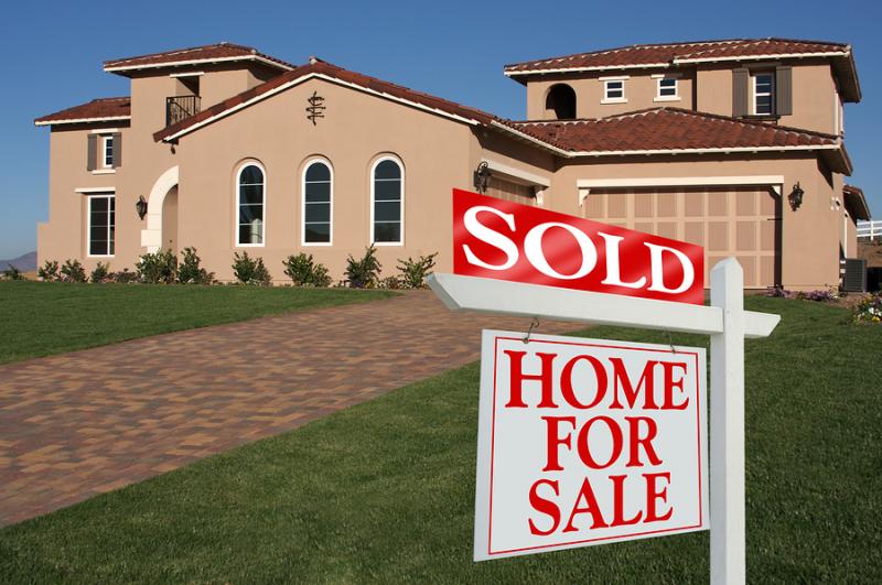 bigstockphoto_Sold_Home_For_Sale_Sign_In_Fro_2311988.225172442_std.jpg