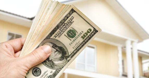 holding-money-up-to-house-outside_573x300.jpg