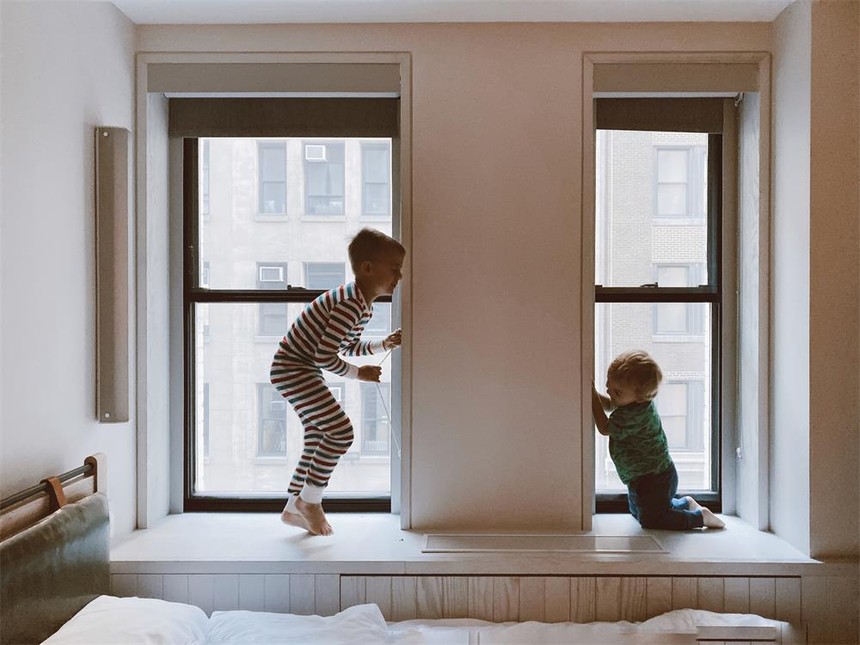 1594105213973432.jpg two-kids-playing-beside-glass-windows-3273851.jpg