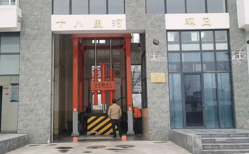 处理100吨的立柱提升式垃圾中转站安装在郑州郊区街道