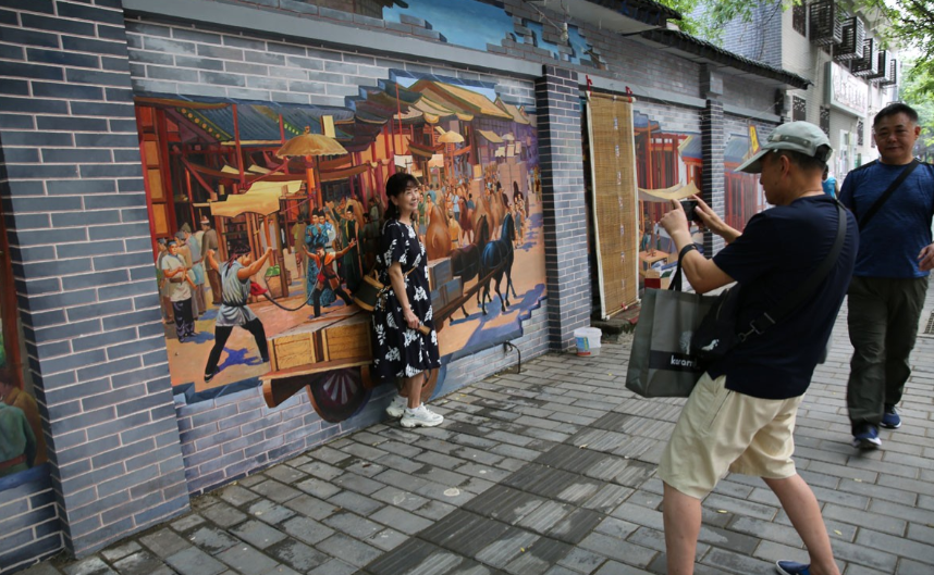 西安城墙根画大唐盛世_西安本视墙绘14年专注陕西西安墙体彩绘-手绘墙