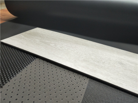 石塑地板為什么背面要貼IXPE靜音墊