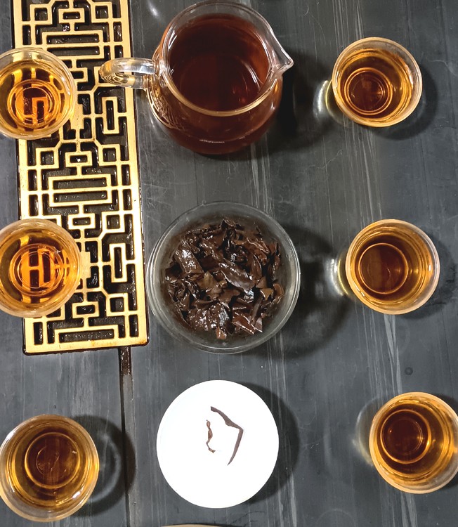 1766032566549816.jpg 半叶红茶叶底和茶汤2.jpg