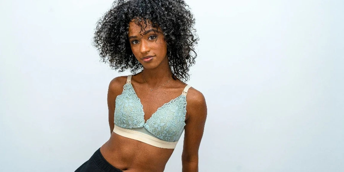 A-woman-in-a-green-bra-and-black-pants-by-Daly-Rosert.webp.jpg