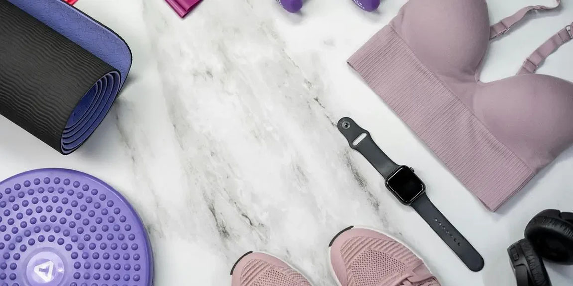 Top-view-of-fitness-equipment-including-smartwatch-bra-sneakers-and-more-on-marble-by-cottonbro-studio.webp.jpg