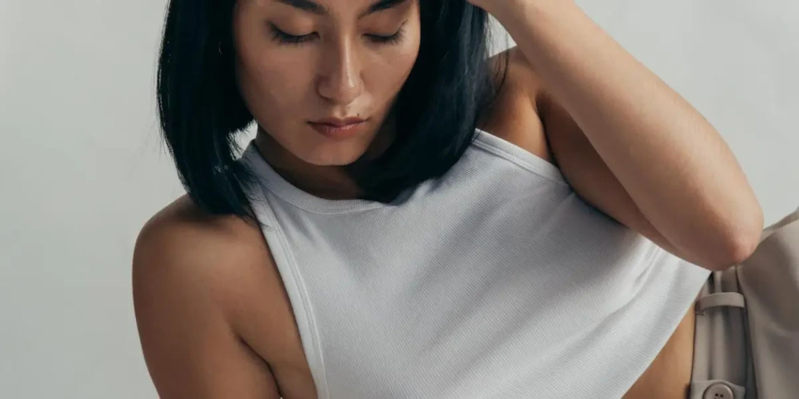 Woman-In-Cropped-White-Vest-Top.webp.jpg