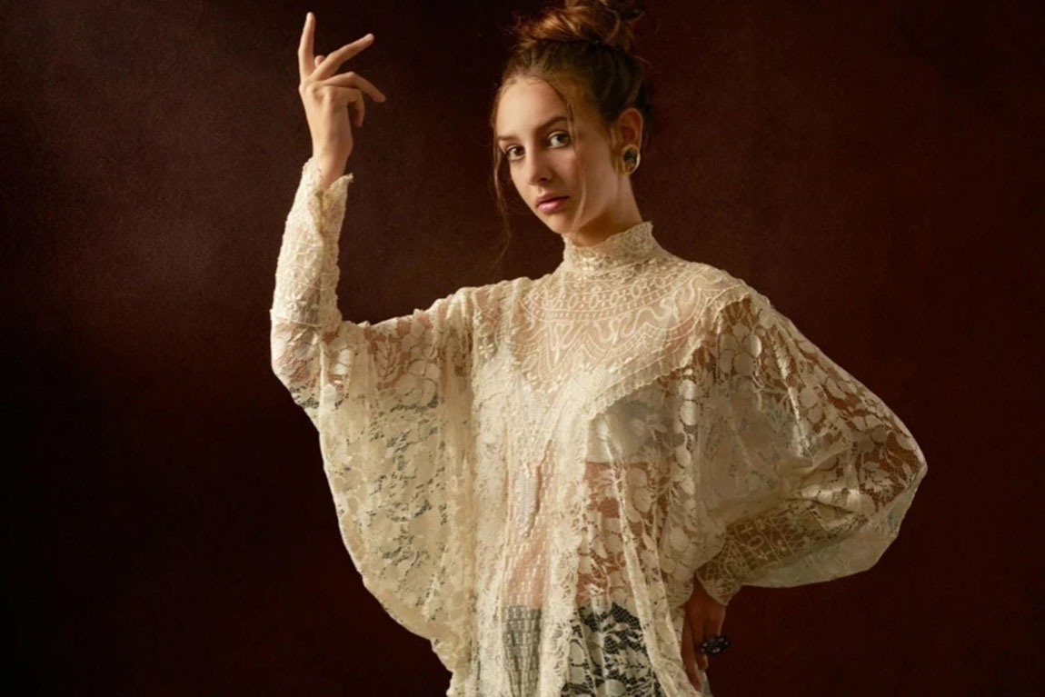 Female-Model-in-Lace-Unusual-Blouse-with-Arm-Raised.webp.jpg