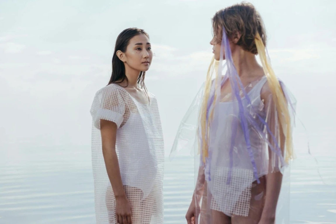 Women-in-trendy-outfits-looking-at-each-other.webp.jpg