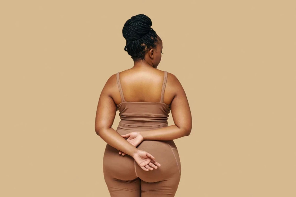 a-close-up-of-a-curvaceous-woman-in-a-bodysuit.webp.jpg