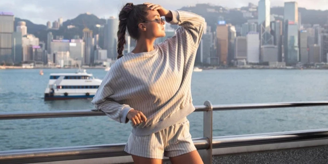 Stylish-Woman-Is-Posing-in-the-Victoria-Harbour-Hong-Kong-City.webp.jpg