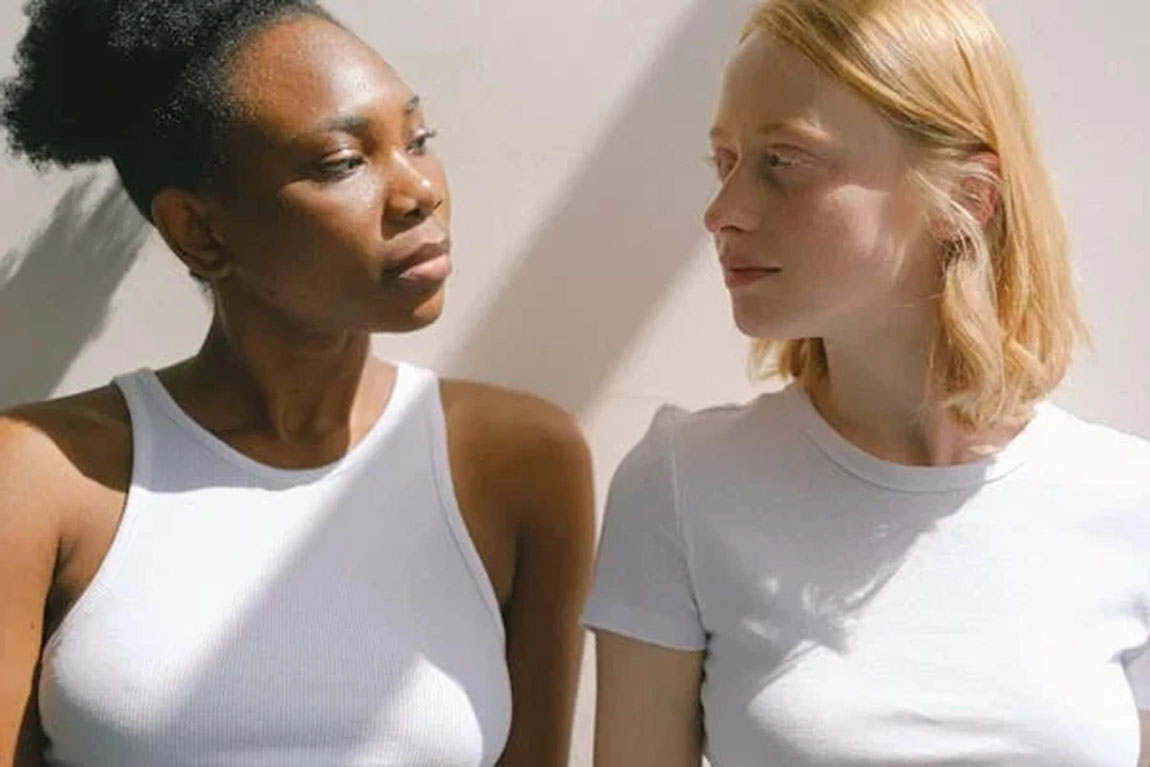 Two-Women-Wearing-White-T-Shirts.webp.jpg