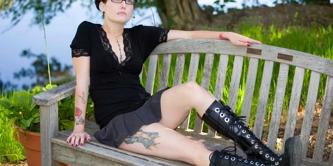 This-is-a-photograph-of-a-24-year-old-model-with-tattoos-and-piercings.webp.jpg