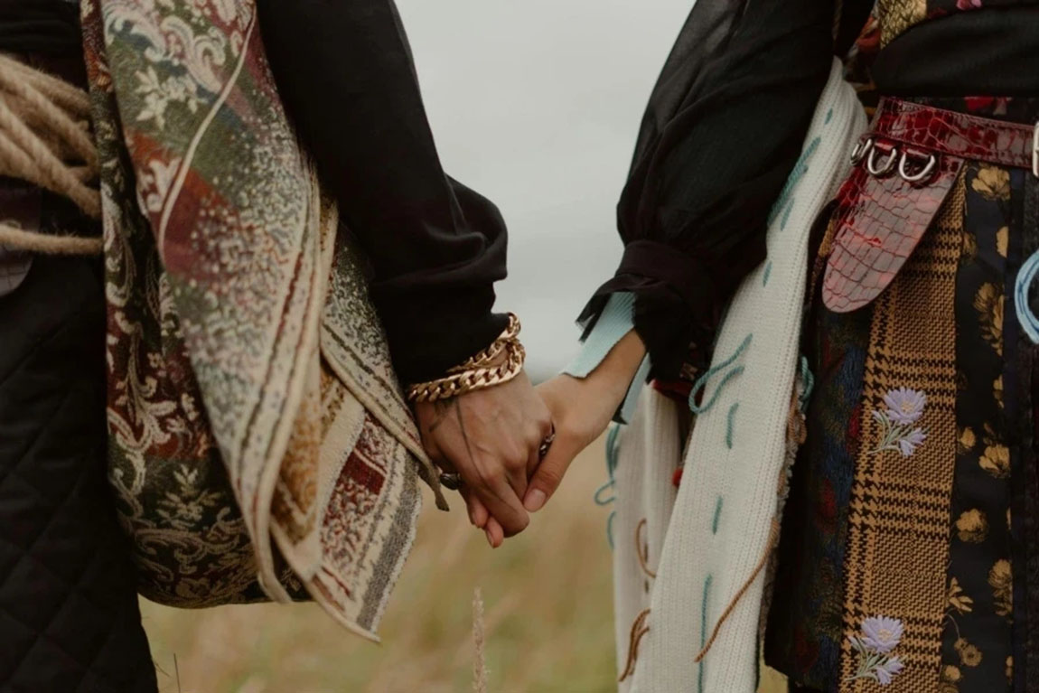 Close-Up-Shot-of-Couple-Holding-Hands.webp.jpg