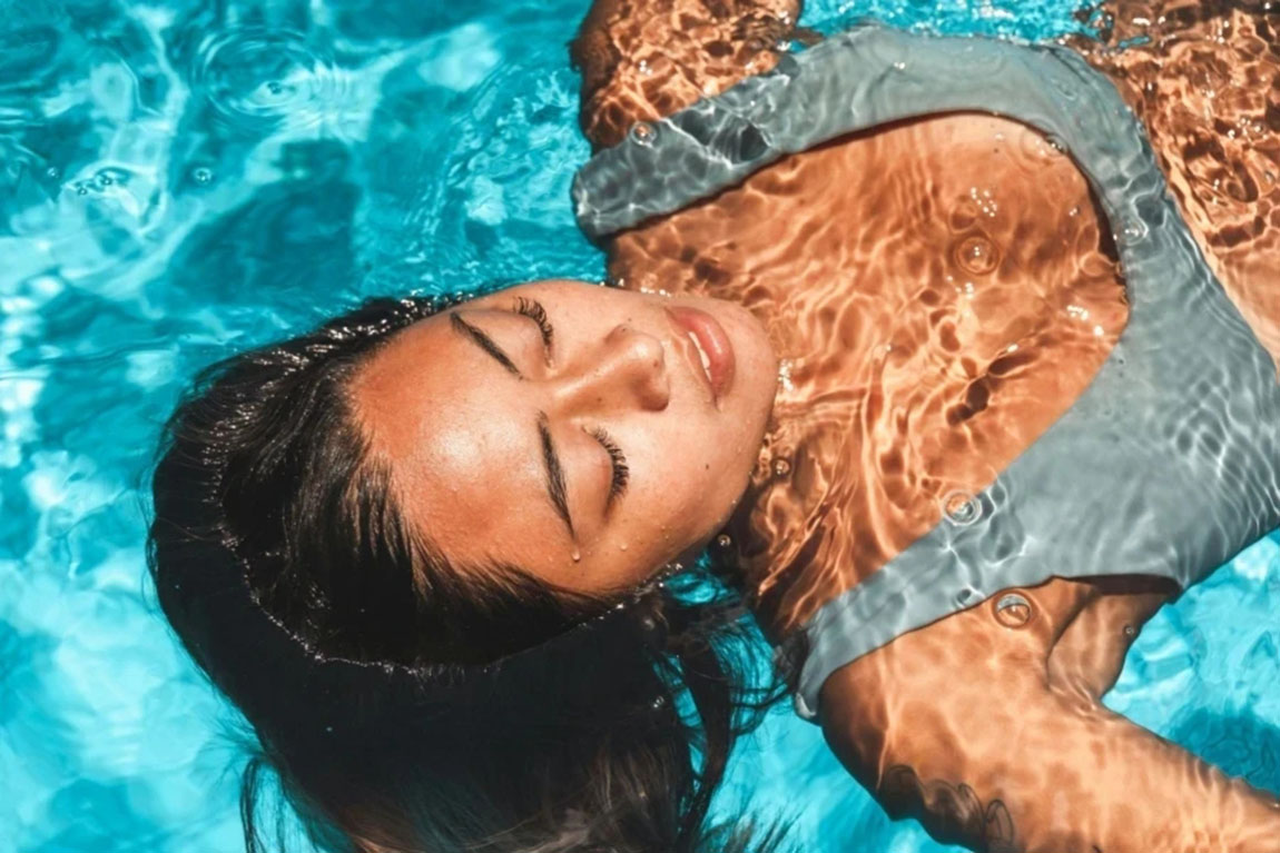 Close-up-of-a-Woman-Swimming-in-a-Pool.webp.jpg