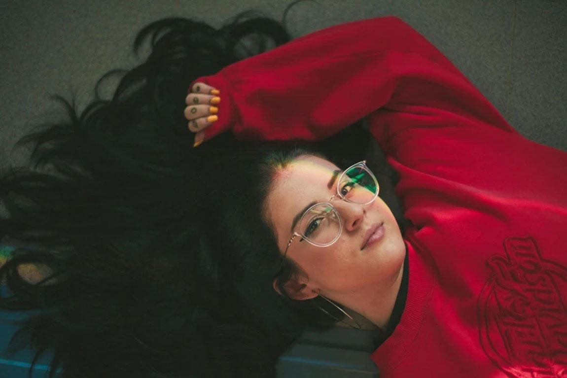 Girl-in-Red-Sweatshirt.webp.jpg