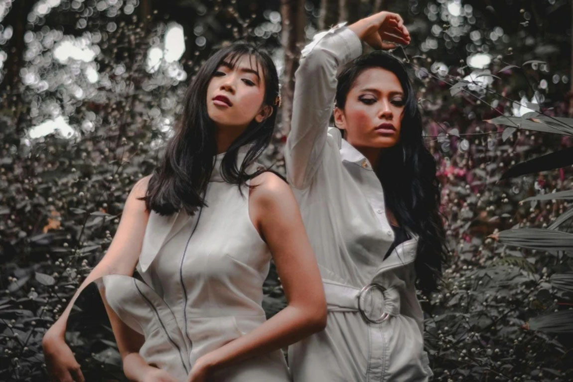 Photo-of-Two-Women-Standing-Near-Plants.webp.jpg