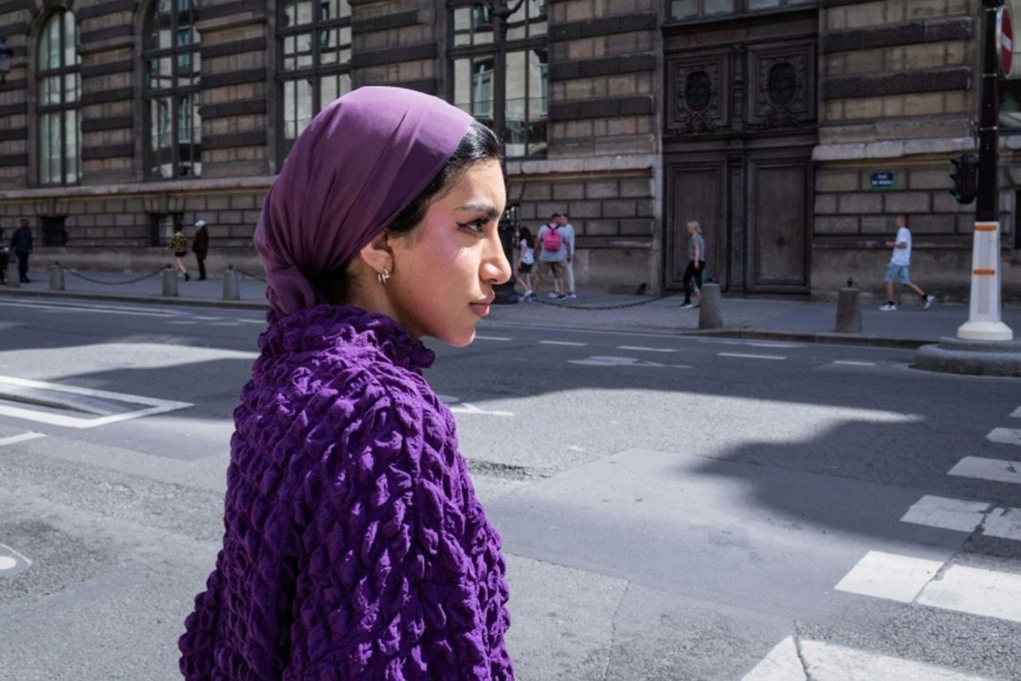 Woman-in-Purple-Shawl-on-Street.webp.jpg
