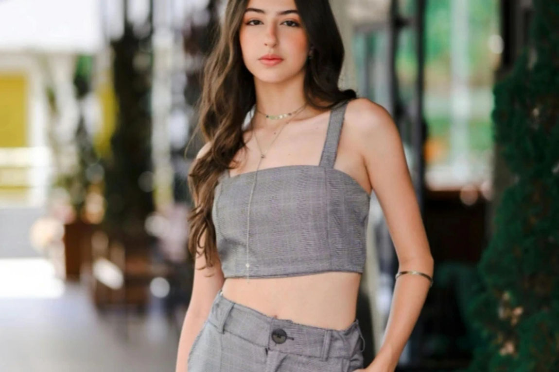 Young-Woman-in-a-Gray-Crop-Top-and-Pants.webp.jpg