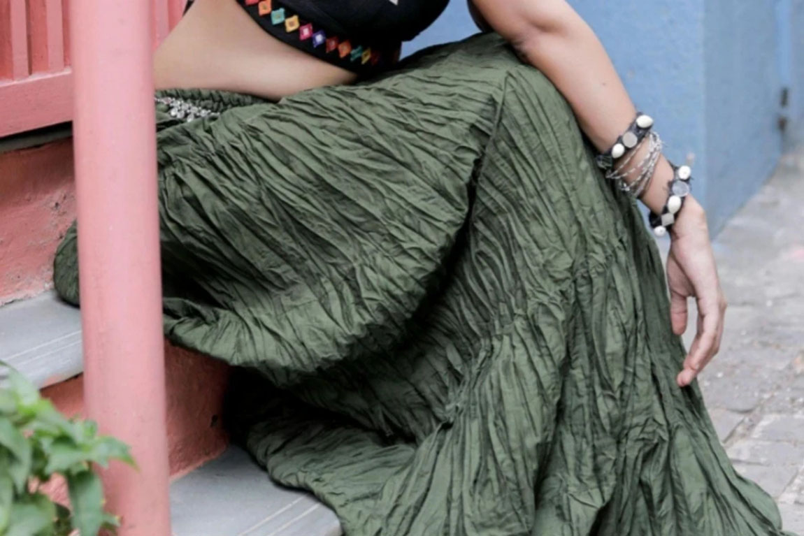 Brunette-Woman-Sitting-in-Top-and-Skirt.webp.jpg