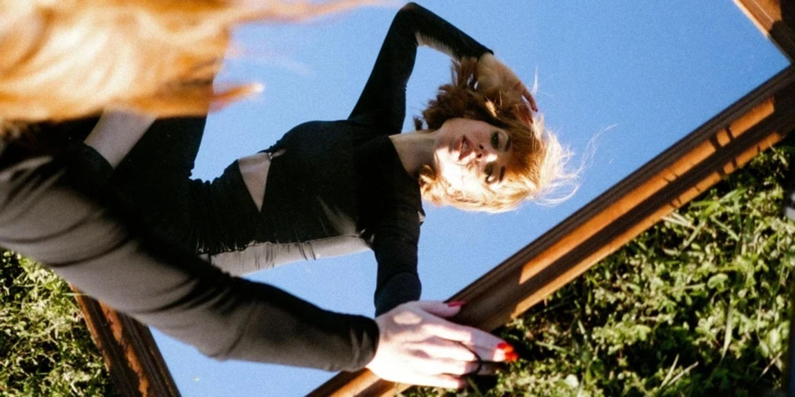 Woman-in-Black-Long-Sleeve-Shirt-and-Black-Pants-1.webp.jpg