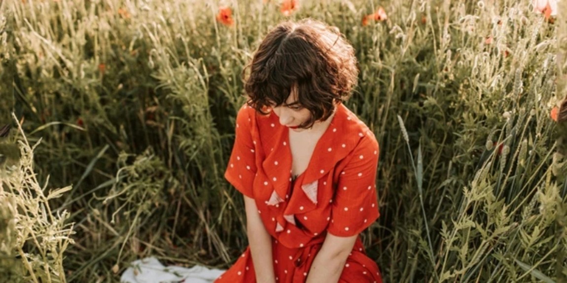 Woman-Wearing-a-Red-Polka-Dot-Dress.webp.jpg