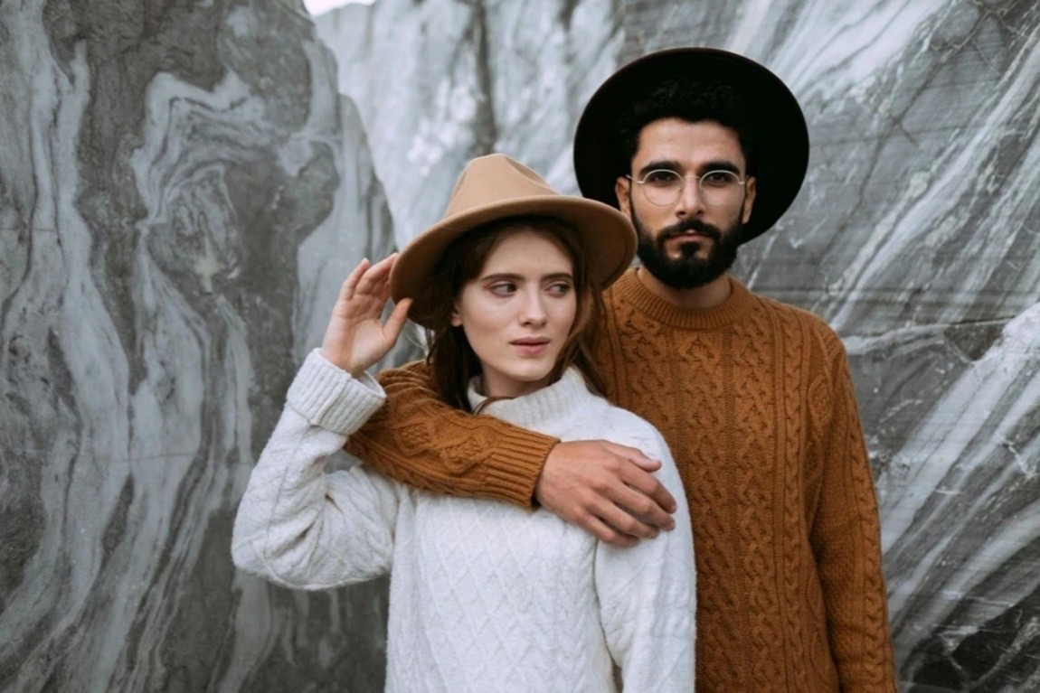 Man-in-Brown-Knitted-Sweater-Hugging-Woman-in-White-Sweater.webp.jpg