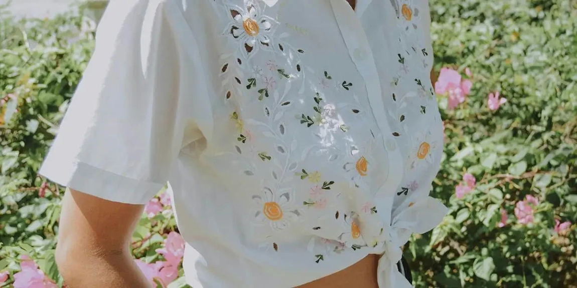 womens-white-and-multicolored-floral-top-by-Bianca-Castillo.webp.jpg