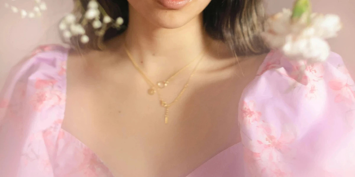 Close-up-portrait-of-a-young-woman-surrounded-by-delicate-flowers-showcasing-elegance-and-grace-by-jasmin-chew.webp.jpg