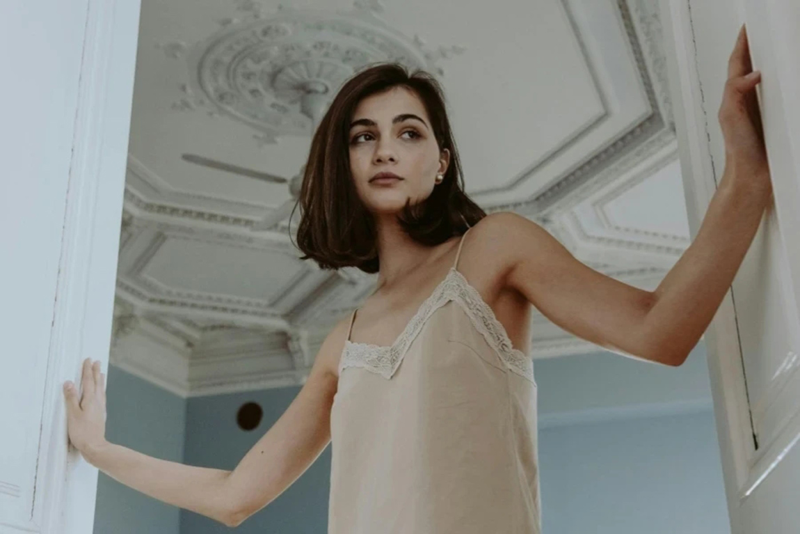 Low-Angle-Shot-of-a-Woman-in-Sleepwear-Looking-Sideways.webp.jpg
