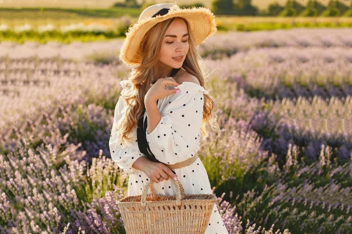 Lady-wearing-a-straw-hat-and-polka-dot-dress.webp.jpg