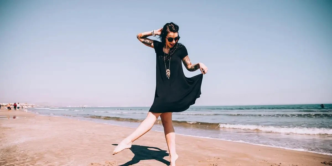 Woman-Dances-On-The-Sand.webp.jpg
