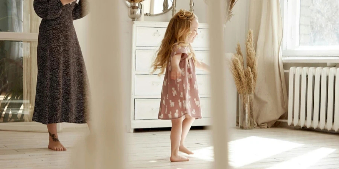 Woman-Walking-Behind-Toddler.webp.jpg
