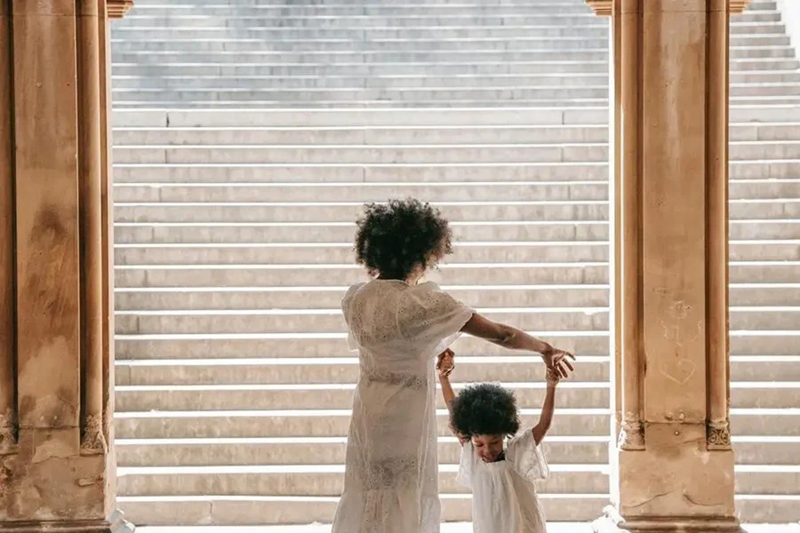 A-Woman-Dancing-with-her-Daughter-by-an-Arch-by-Barbara-Olsen.webp.jpg
