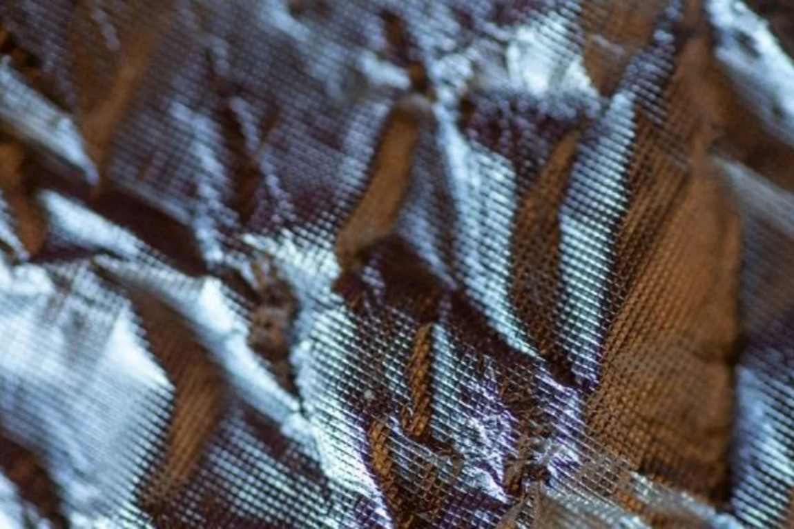 Silver-metallic-cloth-for-apparel.webp.jpg