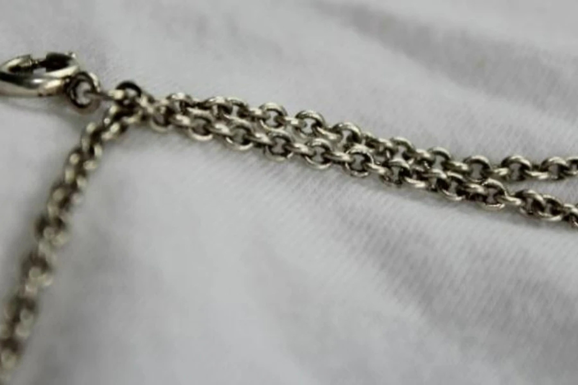 Close-up-of-silver-multilayer-chain-belt.webp.jpg