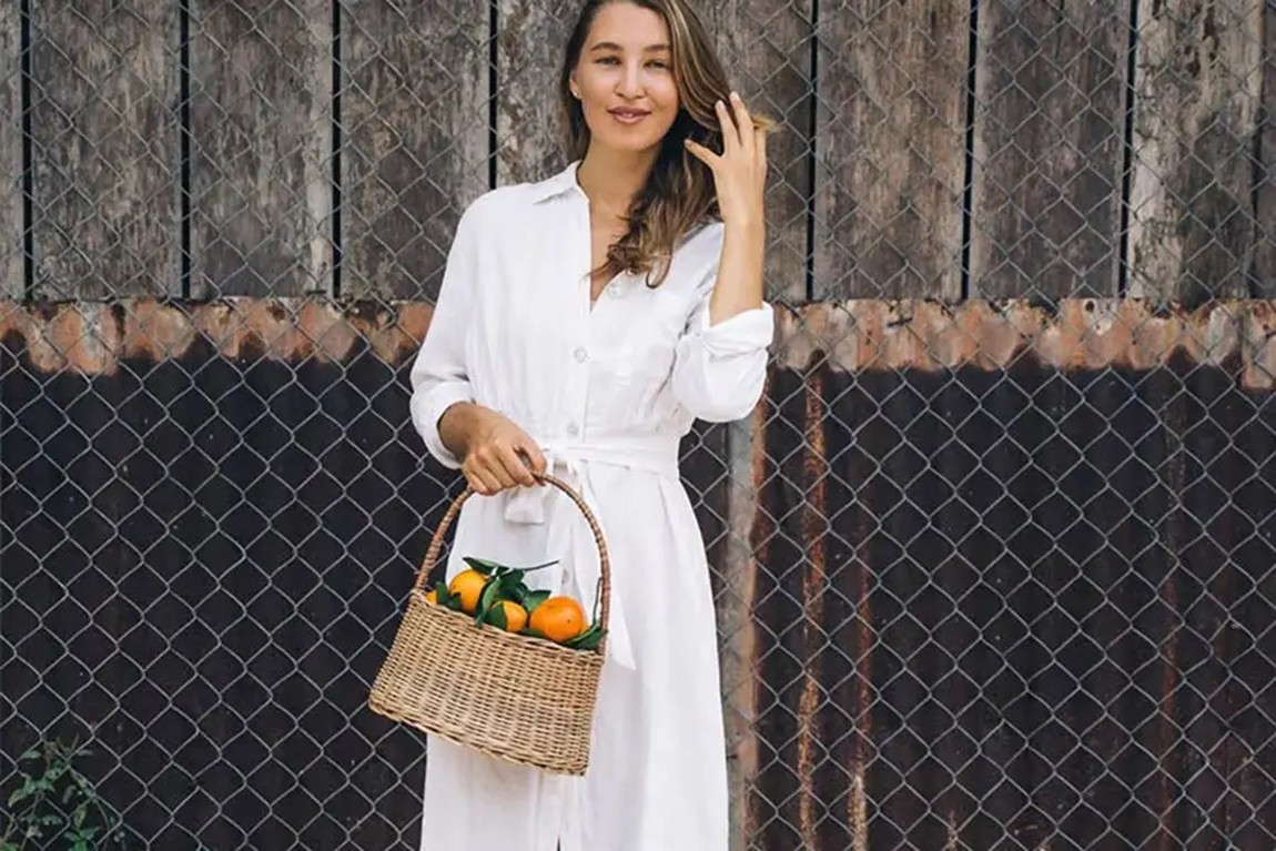 woman-in-cream-colored-shirt-dress-holding-a-basket.webp.jpg