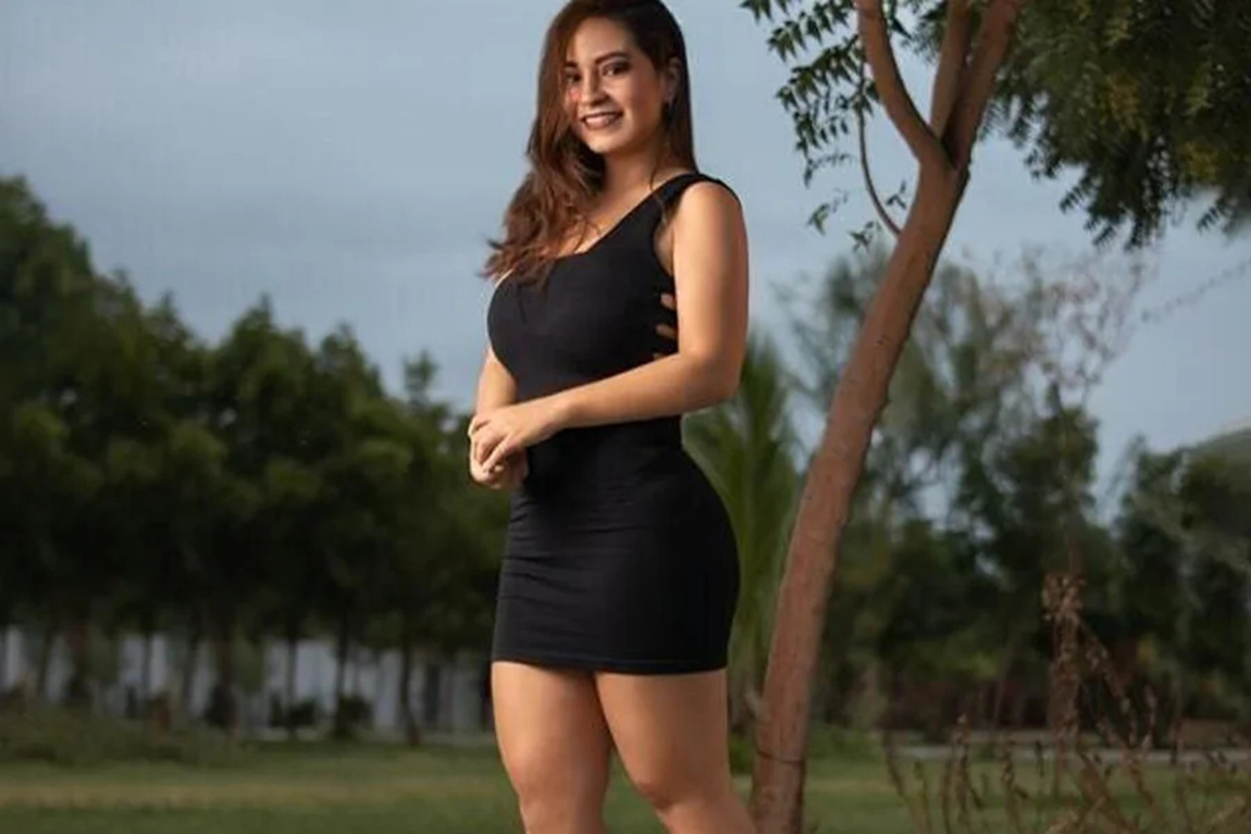 woman-rocking-a-black-blouse-and-black-mini-skirt.webp.jpg