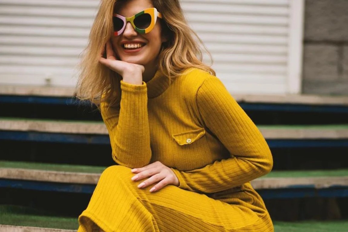 woman-wearing-a-bright-yellow-knitted-dress.webp.jpg