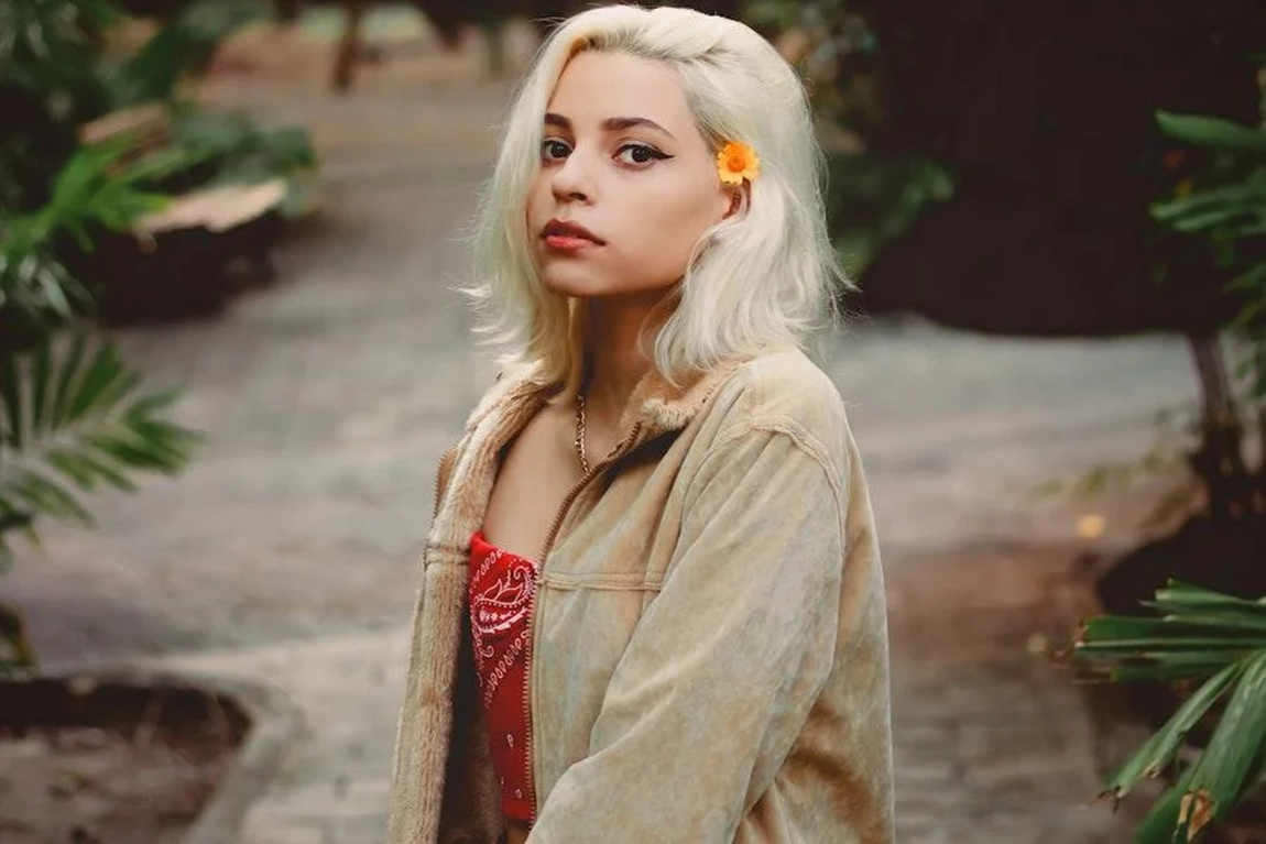 blonde-woman-rocking-a-cream-shacket.webp.jpg