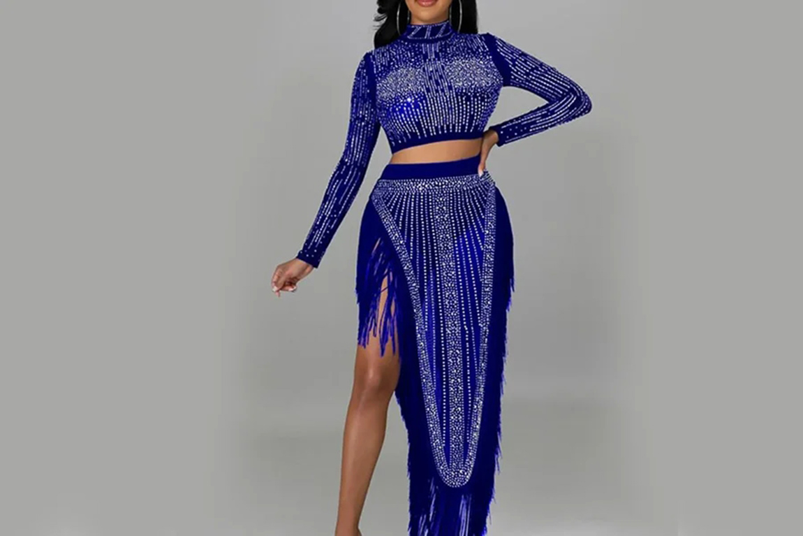 woman-posing-in-textured-and-colorful-dress.webp.jpg