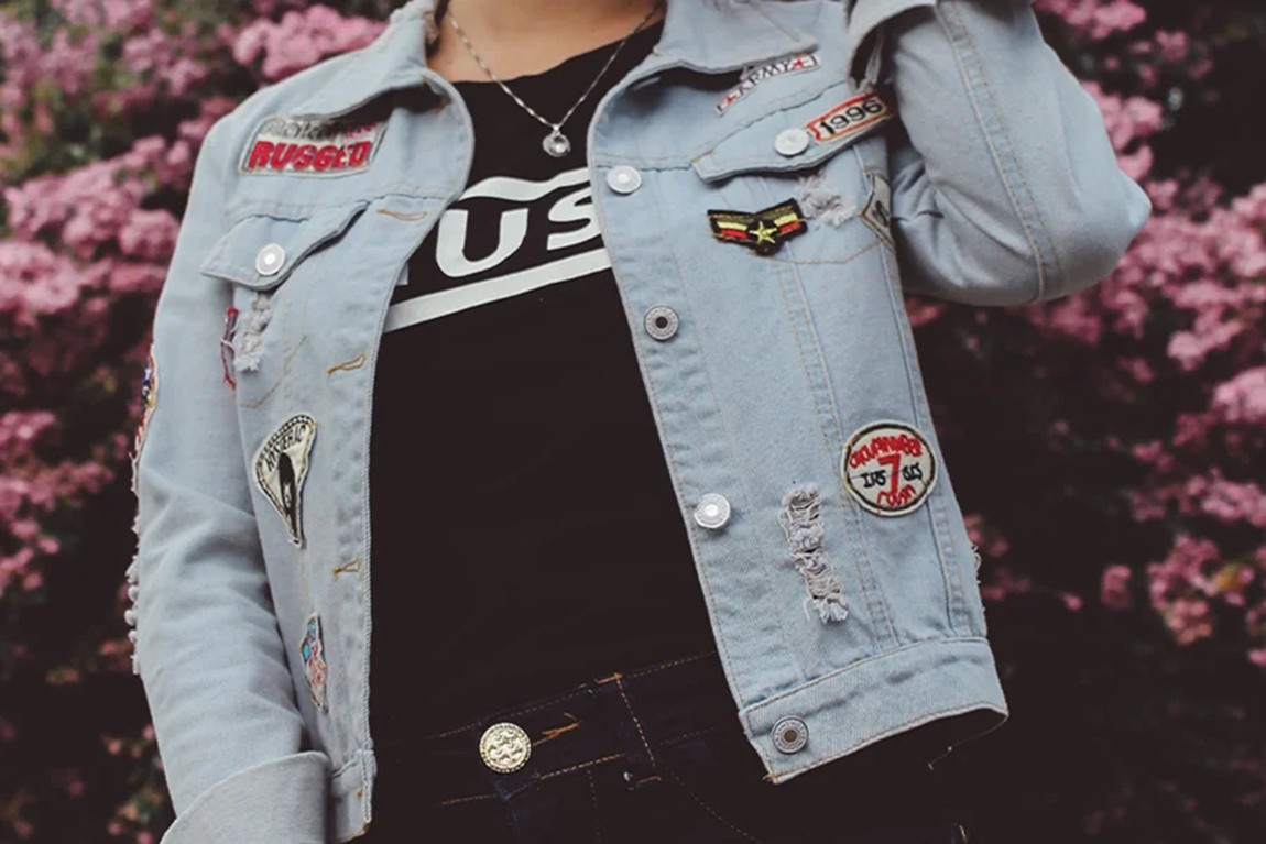 woman-wearing-outfit-with-decorative-buttons-and-branded-trims.webp.jpg
