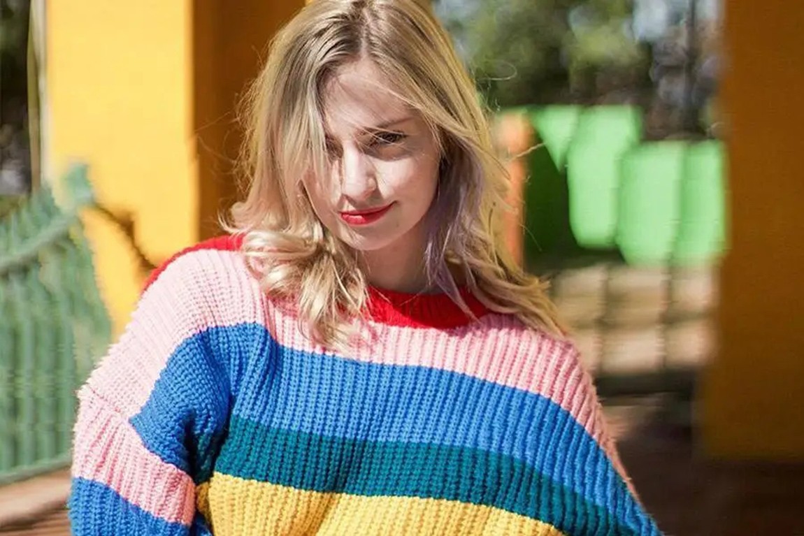 lady-wearing-a-multi-colored-panel-sweater.webp.jpg