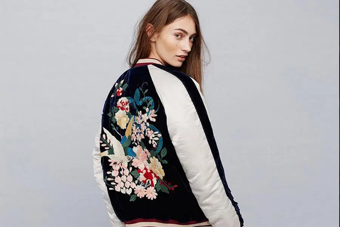 lady-wearing-a-floral-embrioded-bomber-jacket.webp.jpg