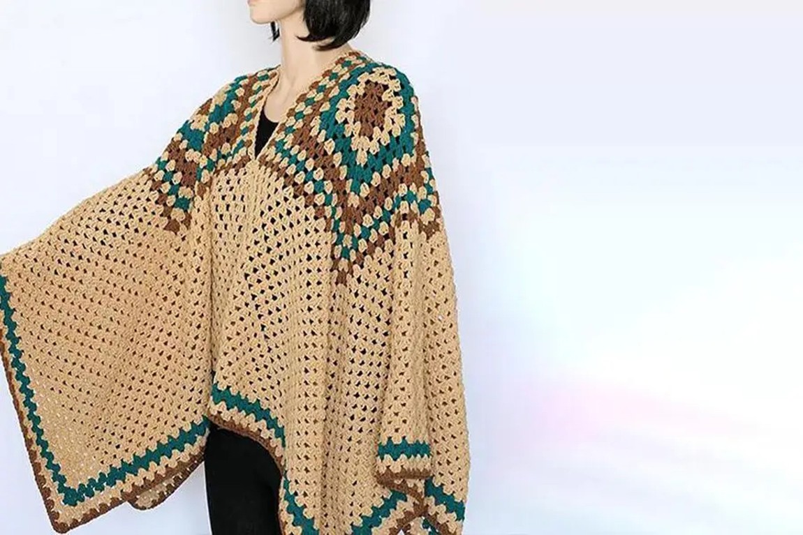a-woman-in-a-camel-crocheted-poncho.webp.jpg