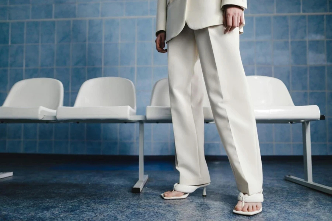 Legs-of-a-Model-in-a-White-Suit-and-Low-heeled-Sandals.webp.jpg