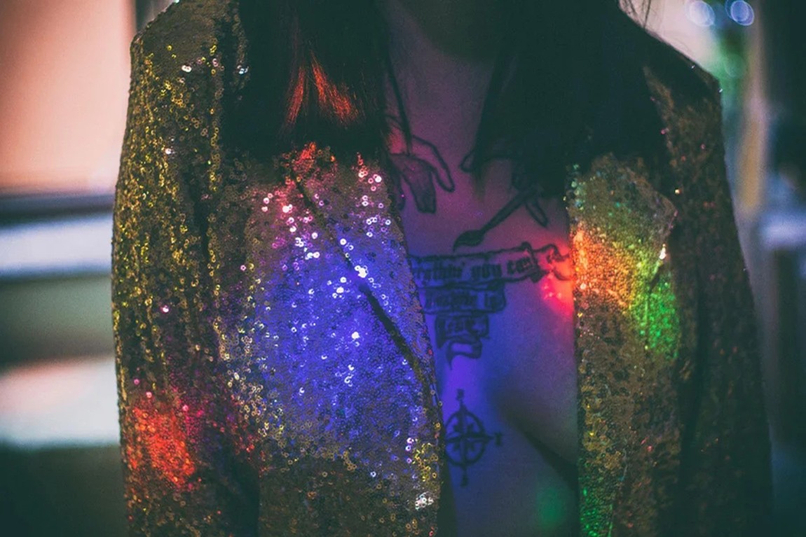 woman-wearing-a-sequin-adorned-jacket.webp.jpg