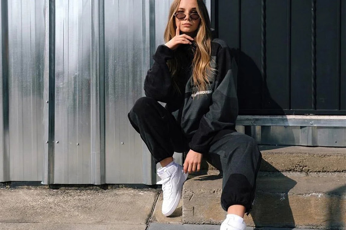 young-woman-rocking-a-black-sweatpant-and-sweatshirt.webp.jpg