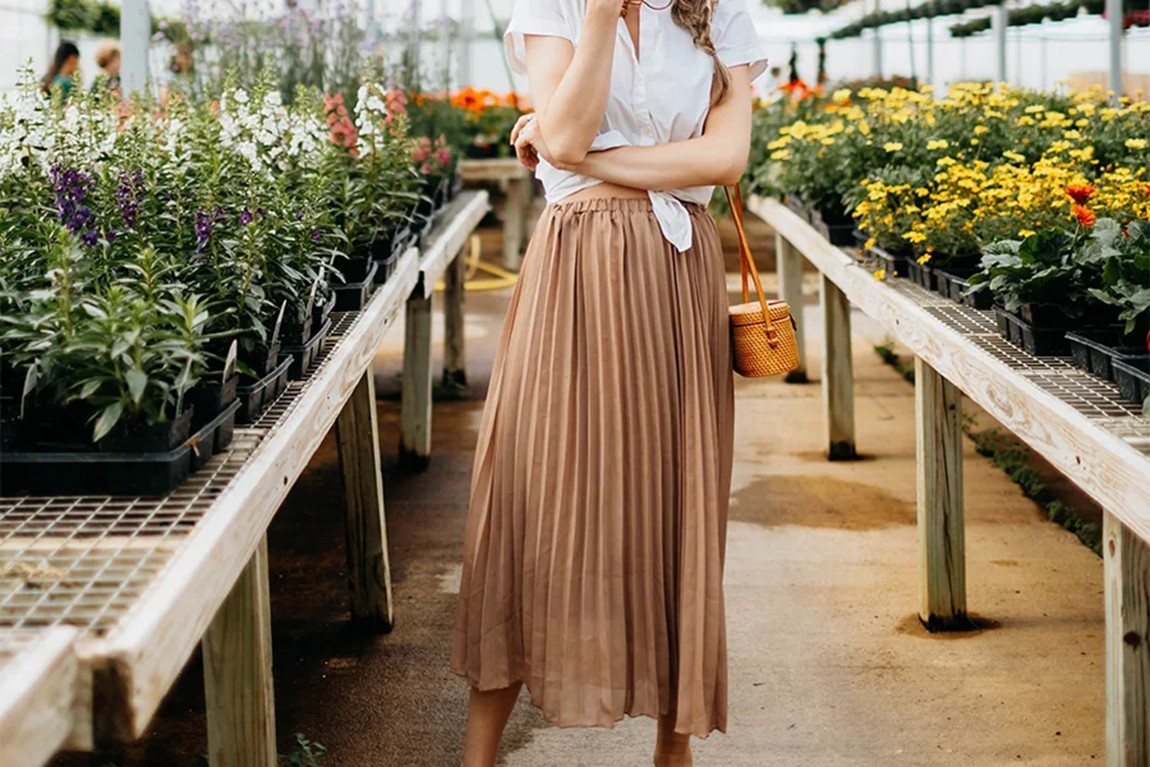 woman-standing-in-a-garden-with-brown-boho-skirt.webp (1).jpg