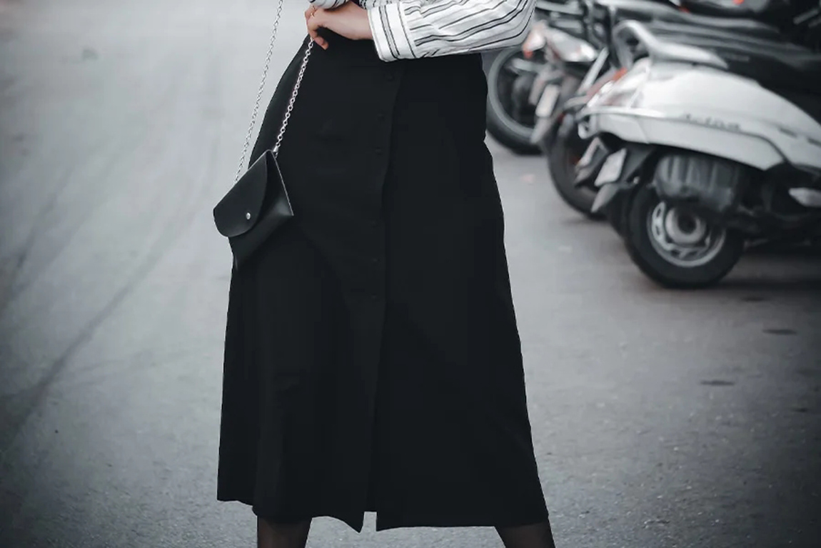 woman-posing-on-road-with-a-black-adjustable-skirt.webp.jpg