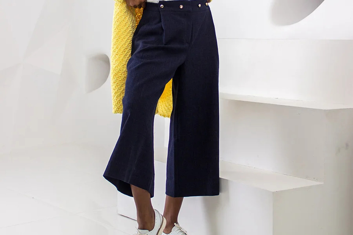 woman-posing-with-navy-blue-y2k-military-trousers.webp.jpg